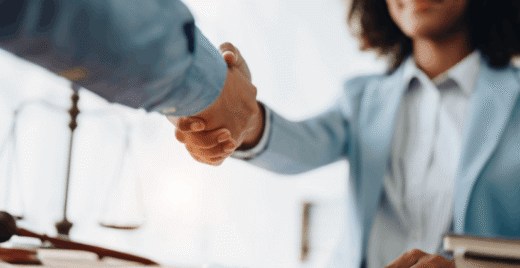 Men and women shaking hands