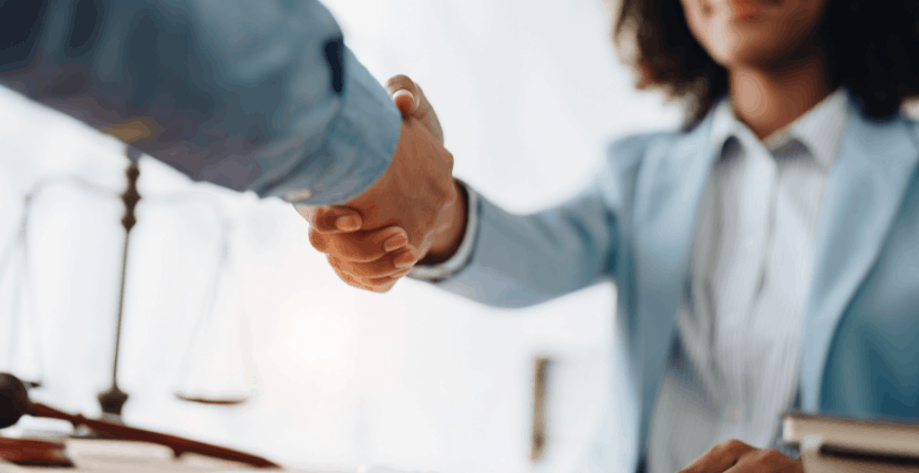 Men and women shaking hands