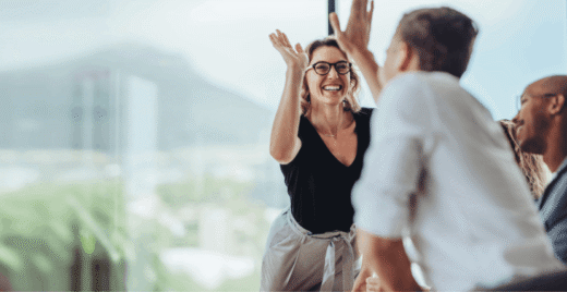 Men and women high-five