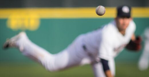 Baseball pitcher throwing a baseball