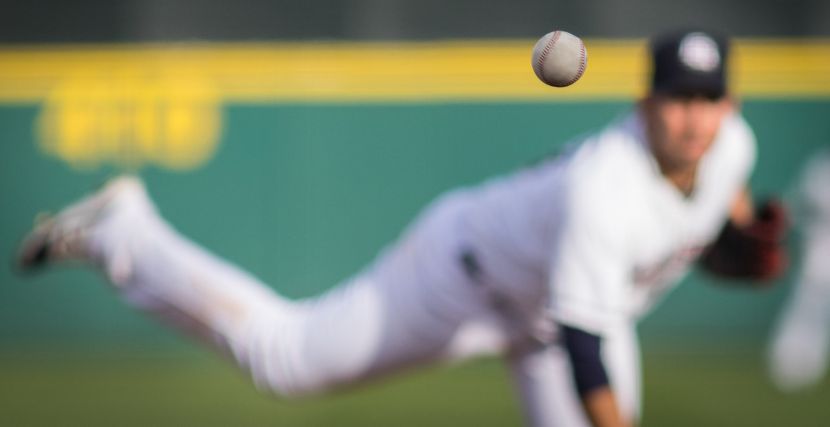 Baseball pitcher throwing a baseball